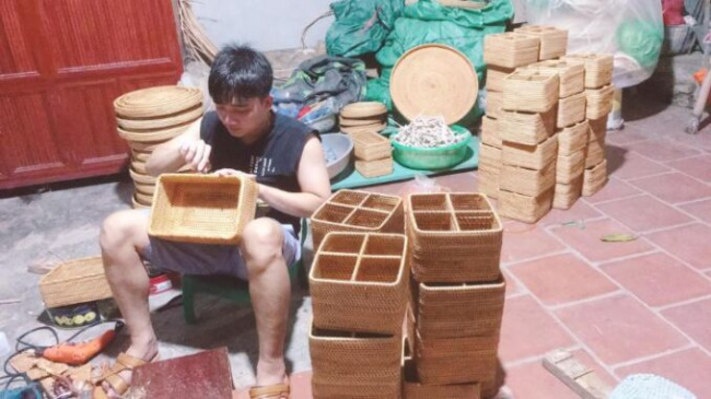 bamboo, hanoi, the young man uses this to knit items, some of which are sold for several million